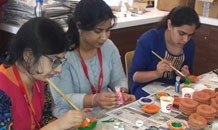 Welcoming Diwali with Painted Lamps