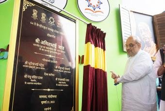 The ceremonial plaque is unveiled by the Home Minister of India